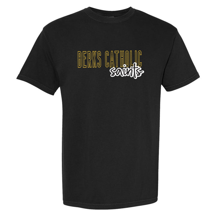 Berks Catholic Saints Outline Script comfort colors t-shirt in Black: outlined BERKS CATHOLIC letters with saints script across the front