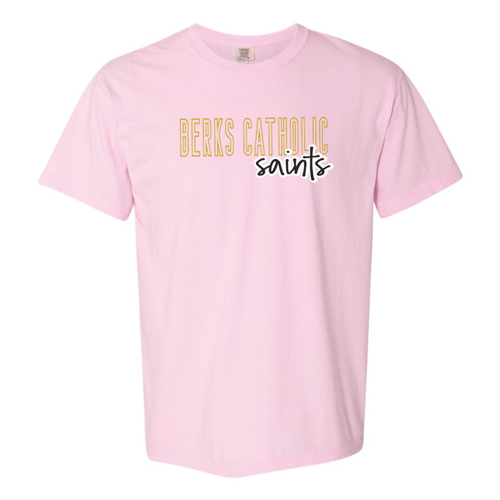 Berks Catholic Saints Outline Script comfort colors t-shirt in Blossom: outlined BERKS CATHOLIC letters with saints script across the front