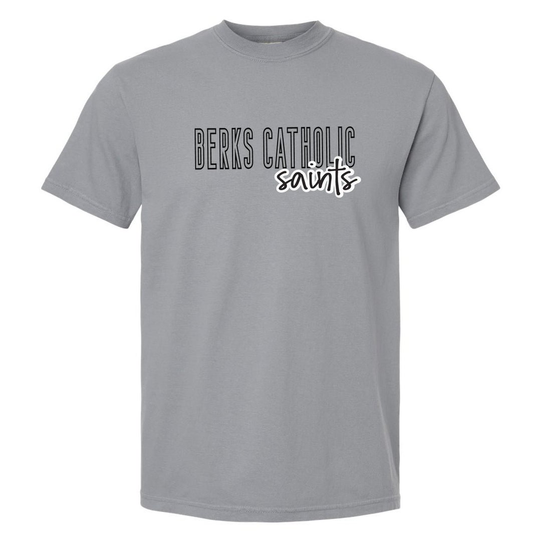 Berks Catholic Saints Outline Script comfort colors t-shirt in Granite: outlined BERKS CATHOLIC letters with saints script across the front