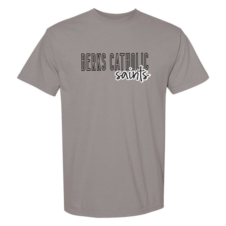Berks Catholic Saints Outline Script comfort colors t-shirt in Grey: outlined BERKS CATHOLIC letters with saints script across the front