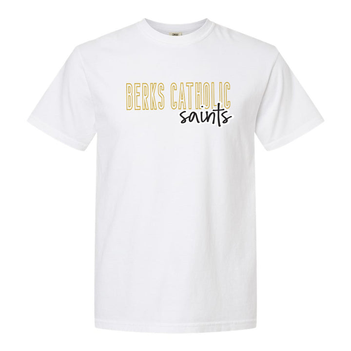 Berks Catholic Saints Outline Script comfort colors t-shirt in White: outlined BERKS CATHOLIC letters with saints script across the front