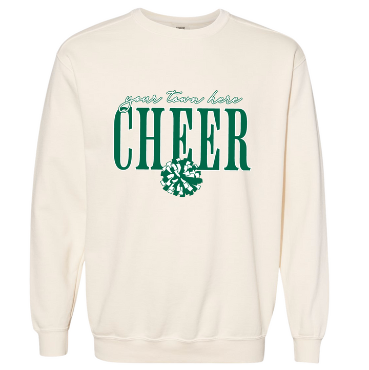 Ivory garment-dyed cheer crewneck sweatshirt with your town name in script above big green CHEER lettering and a pom