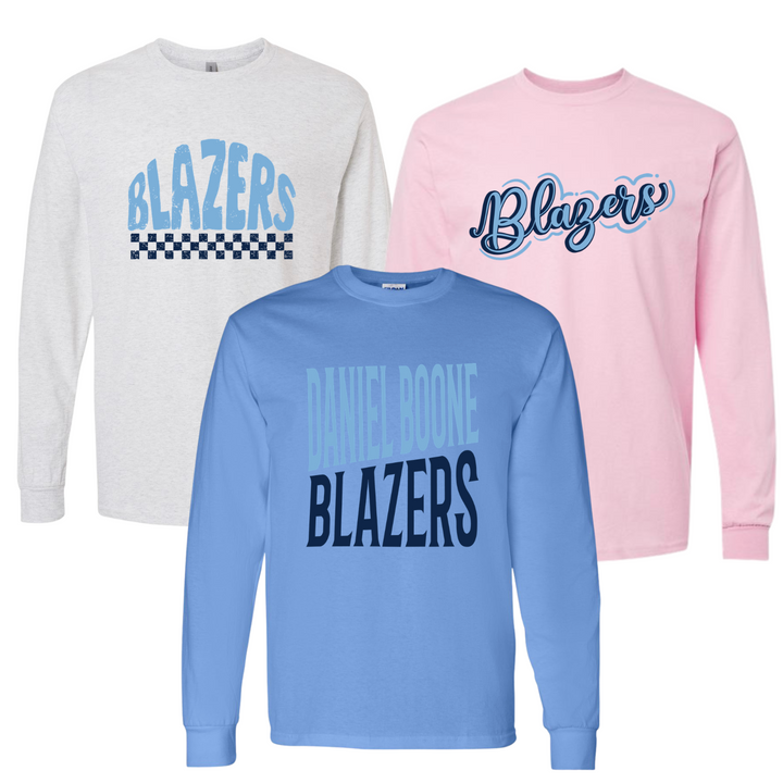 Three Daniel Boone Blazers long sleeve t-shirts in ash, light pink and carolina blue, each with a different Blazers design in navy and light blue