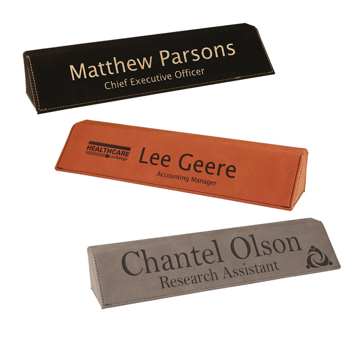 Engraved Desk Name Plate shown in black/gold, rawhide and gray