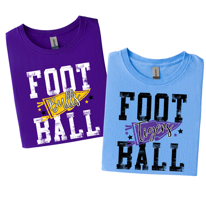 Football pennant t-shirts folded flat: purple tee with a gold Bulls pennant and light blue tee with a purple Tigers pennant