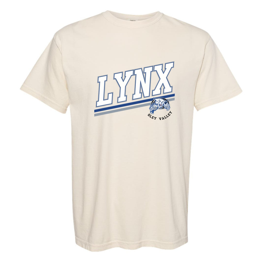 Oley Valley Lynx Slanted Stripe comfort colors t-shirt in Ivory: bold varsity LYNX lettering over a slanted double stripe, with a small lynx mascot badge and Oley Valley
