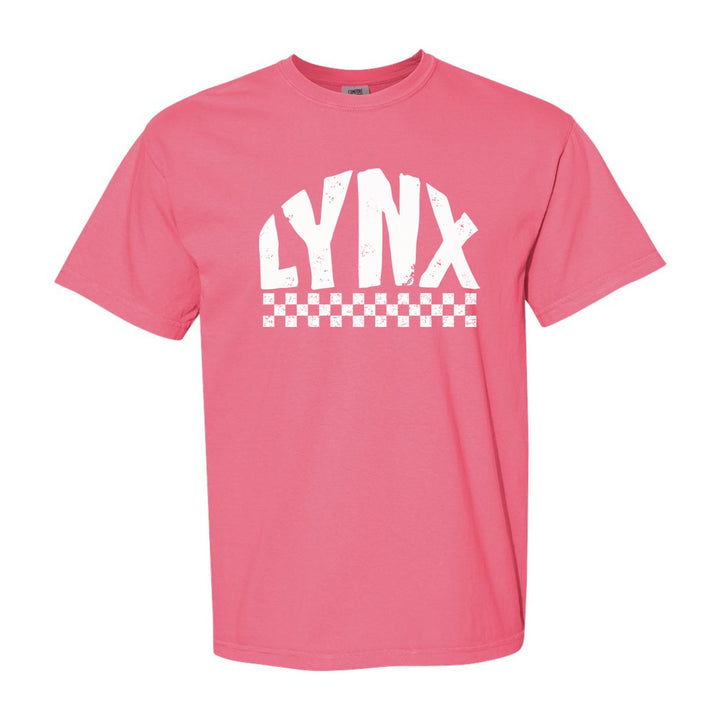 Oley Valley Lynx Checkered comfort colors t-shirt in Crunchberry: distressed LYNX lettering over a checkerboard band