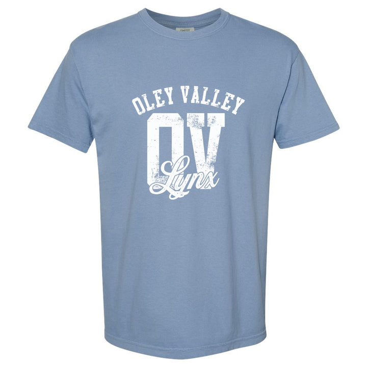 Oley Valley Lynx OV Monogram comfort colors t-shirt in Washed Denim: OLEY VALLEY arched over a distressed OV monogram with Lynx script